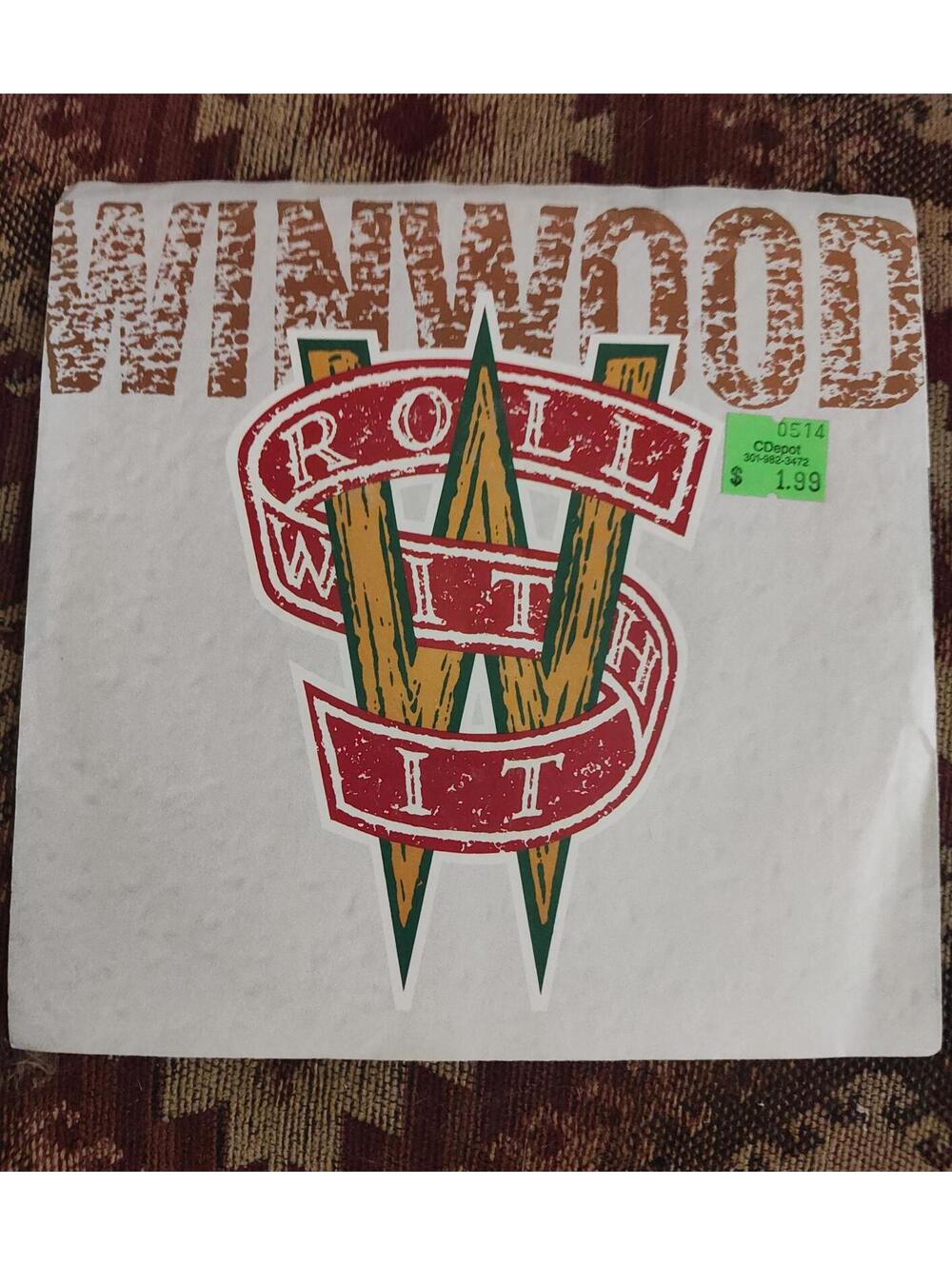 Steve Winwood- roll with it- vinyl 45 w pic sleeve M/NM